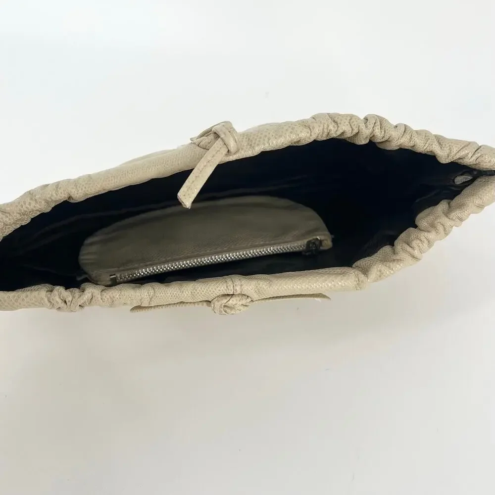 80s beige clutch bag Carlos Falchi 1980s vintage